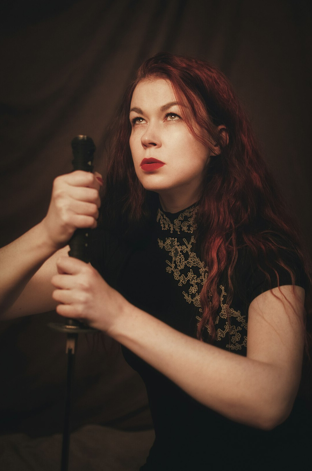 woman holding microphone